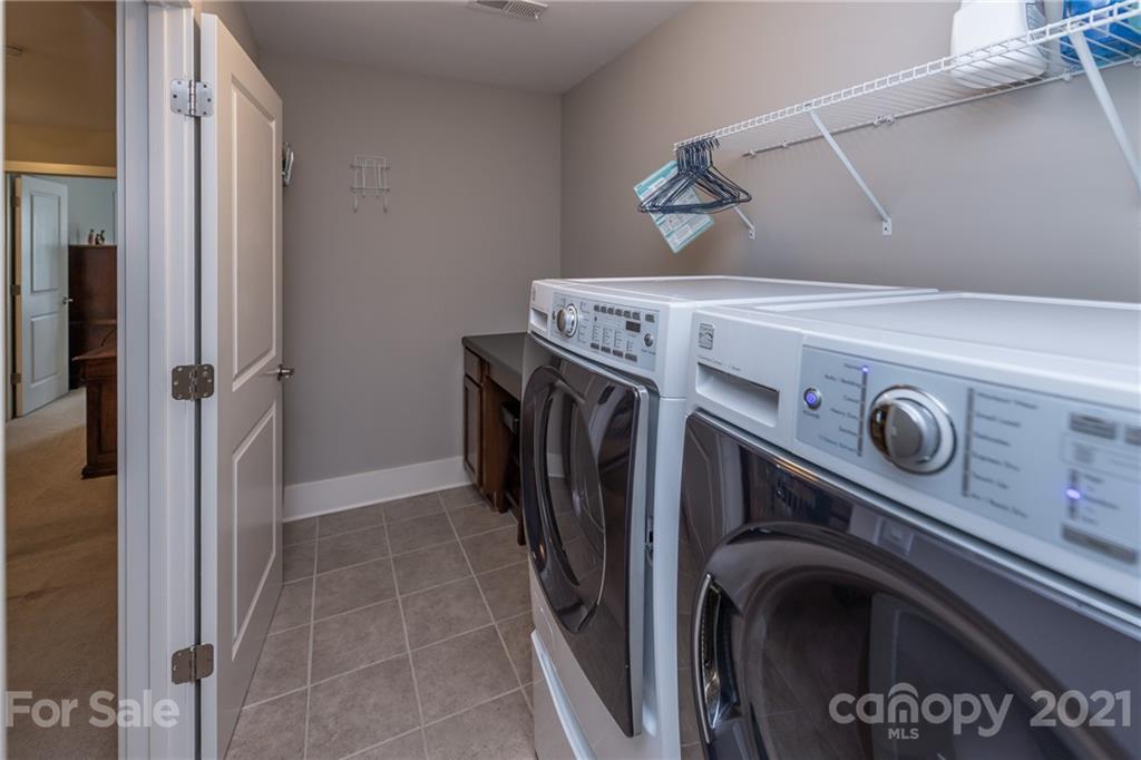 2142 Bluebell Way Tega Cay, SC 29708 - Photo 29 of 48 a utility room with dryer and washer