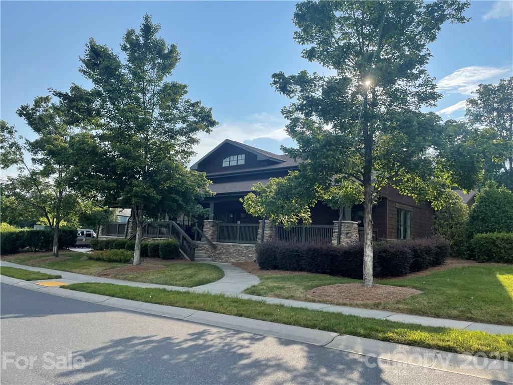 2142 Bluebell Way Tega Cay, SC 29708 - Photo 38 of 48 a front view of a house with a yard