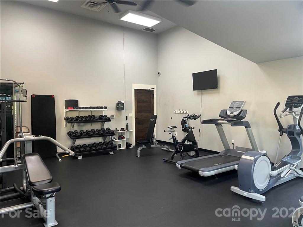 2142 Bluebell Way Tega Cay, SC 29708 - Photo 47 of 48 a view of a room with gym equipment