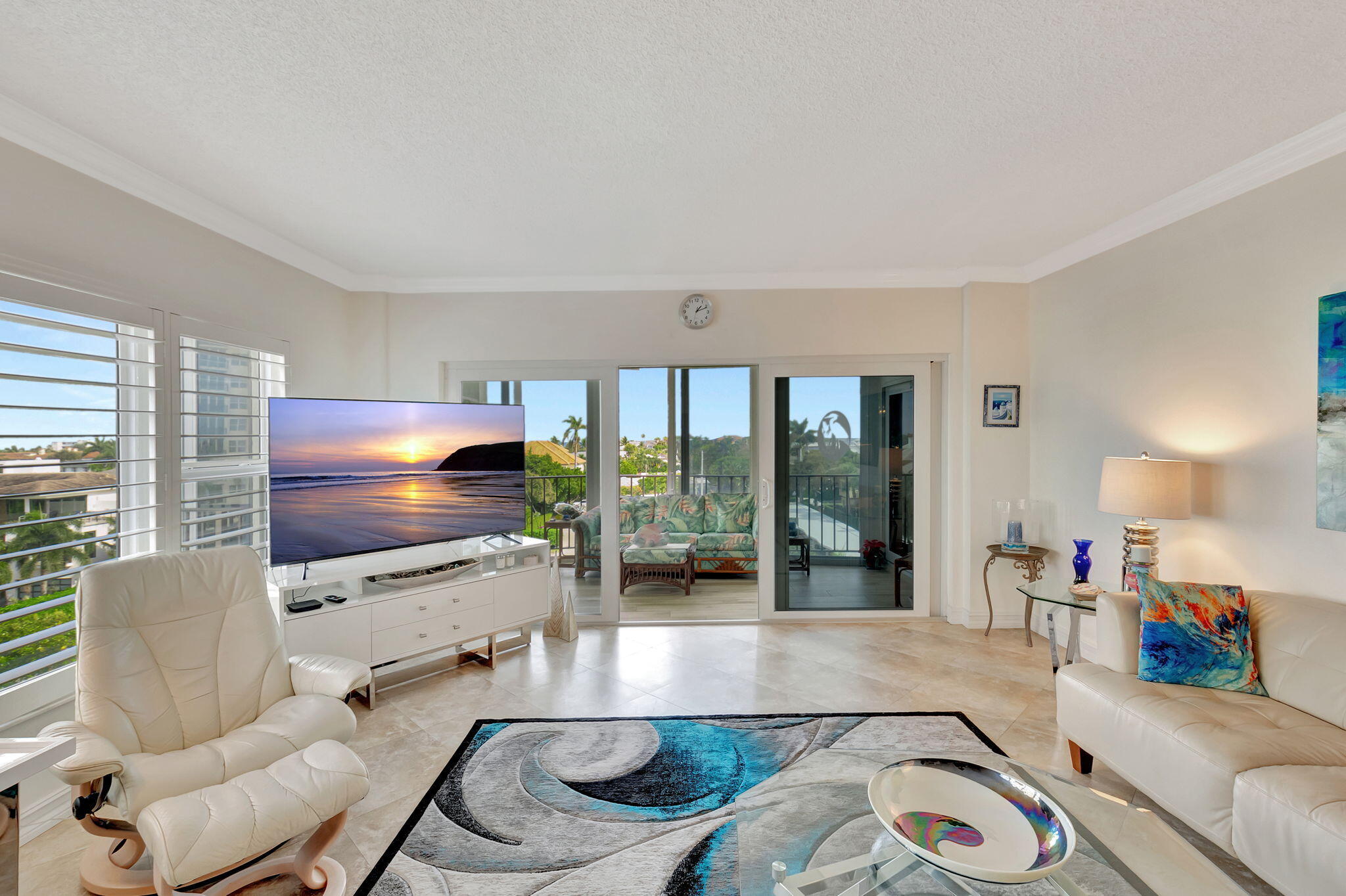 220 Mac Farlane Drive, Unit S505 Delray Beach, FL 33483 - Photo 6 of 72 a living room with furniture and a flat screen tv