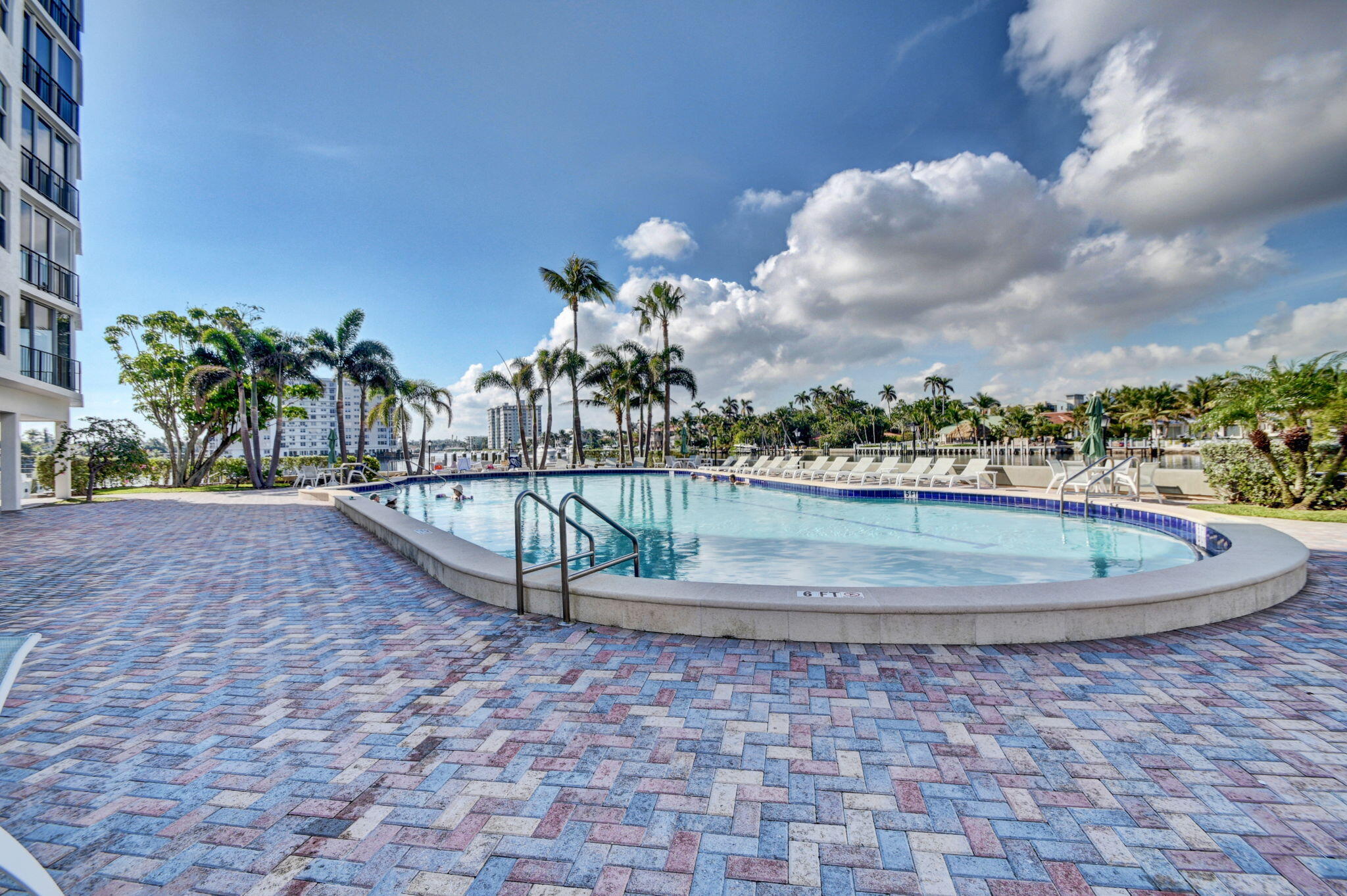 220 Mac Farlane Drive, Unit S505 Delray Beach, FL 33483 - Photo 66 of 72 a view of a swimming pool with a yard
