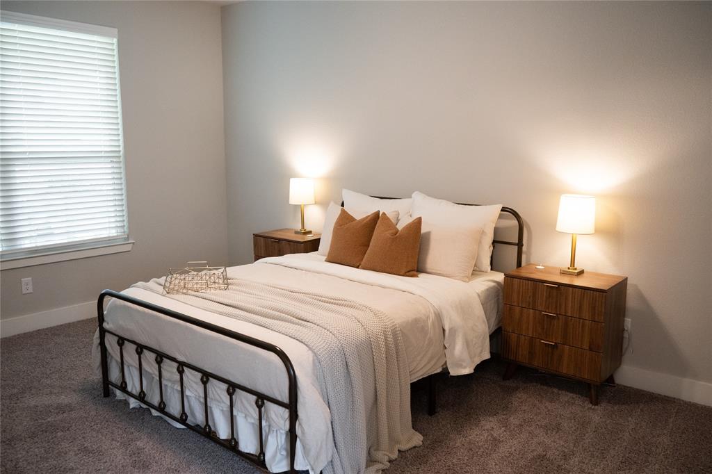 7909 Townsend Drive Waco, TX 76708 - Photo 10 of 22 Neutral wall tones complement plush carpet flooring