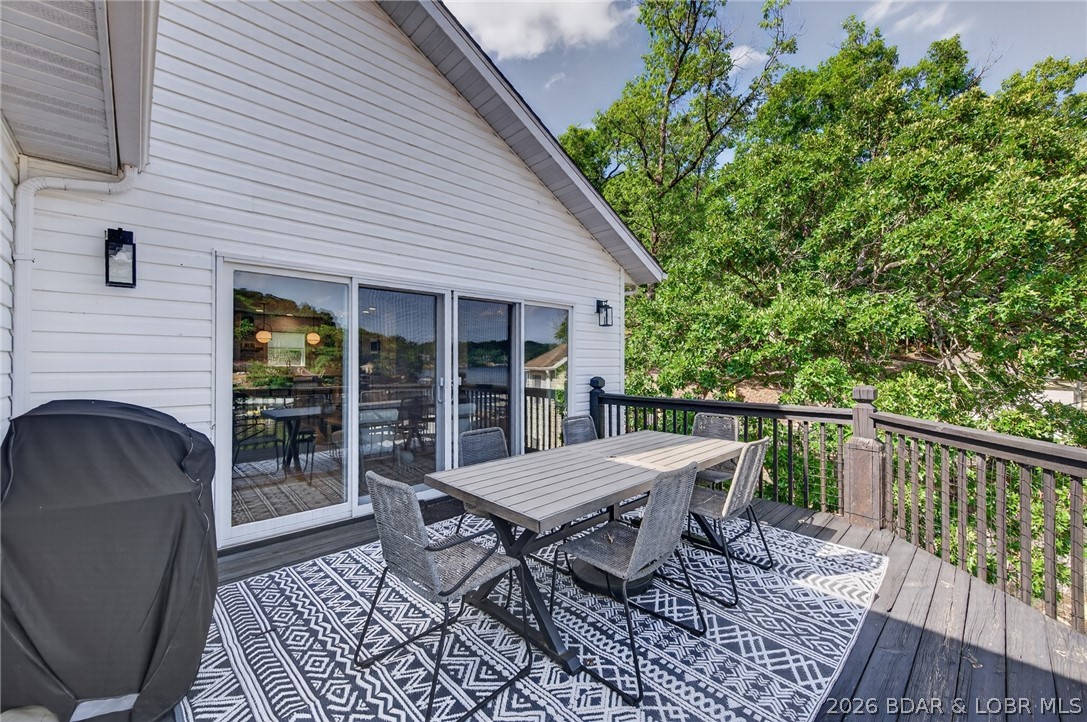 25 Old Sassafrass Road Eldon, MO 65026 - Photo 49 of 58 Upper deck and bbq area.