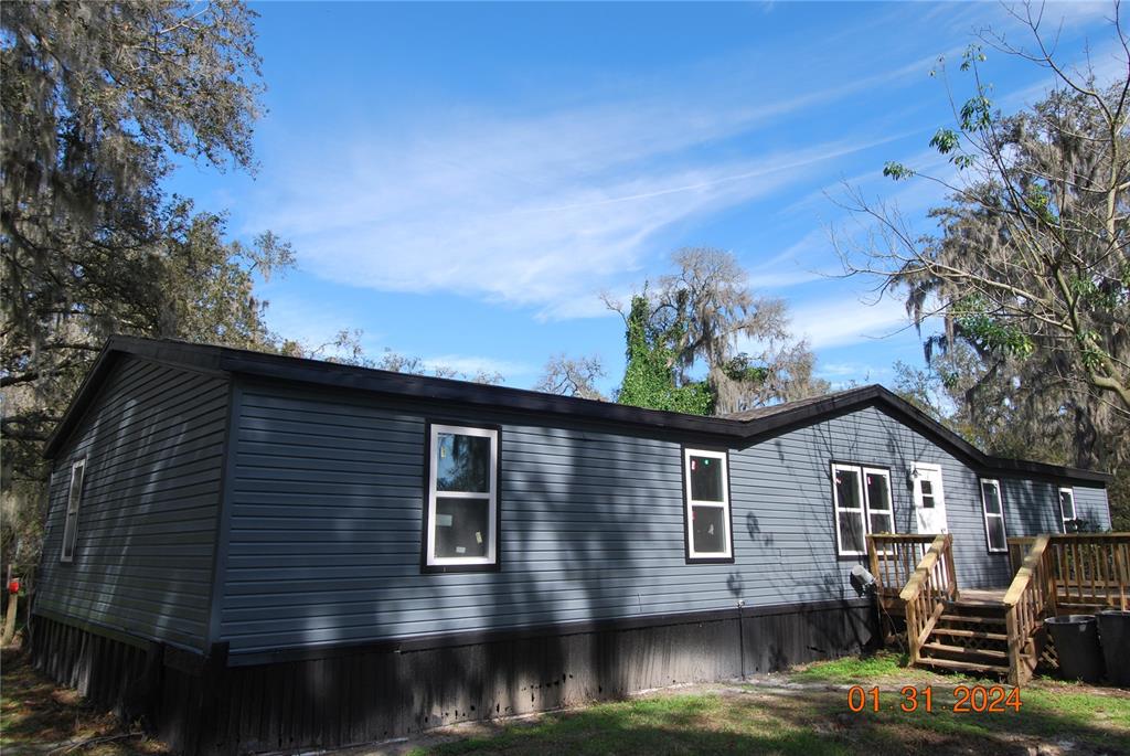 9848 Brantley Road Lithia, FL 33547 - Photo 3 of 25 REAR