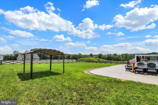 a view of a balcony with two chairs