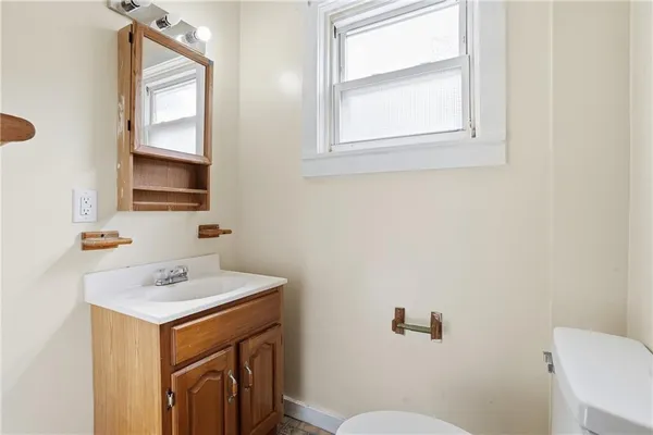 a bathroom with a tub shower and a sink