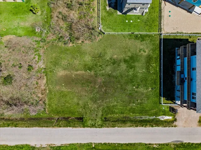 a view of swimming pool with a yard