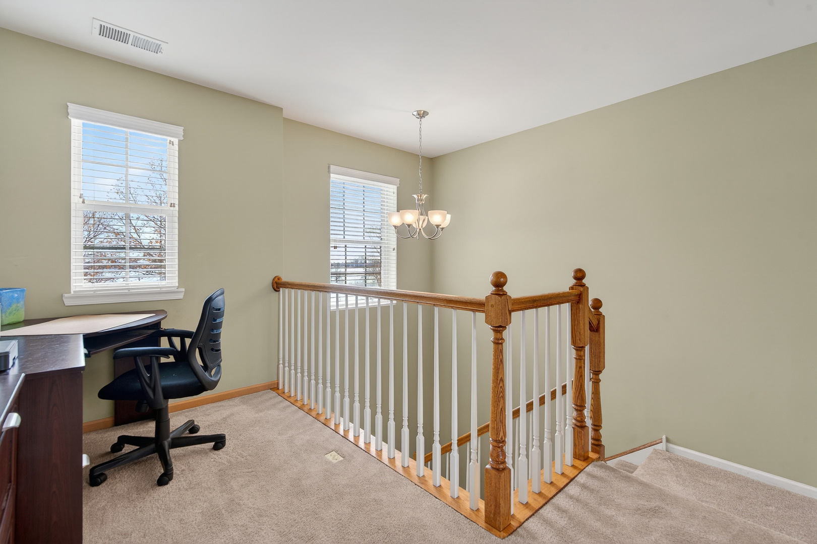 234 Longview Drive Elgin, IL 60124 - Photo 22 of 37 a view of a workspace with furniture and a window