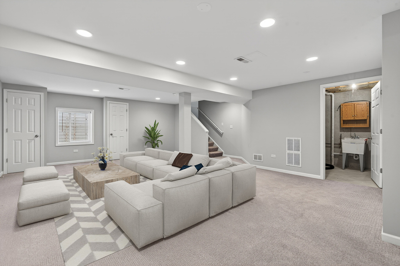 234 Longview Drive Elgin, IL 60124 - Photo 32 of 37 a living room with furniture and a potted plant