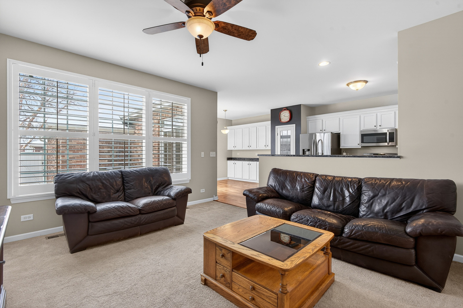 234 Longview Drive Elgin, IL 60124 - Photo 6 of 37 a living room with furniture and a large window