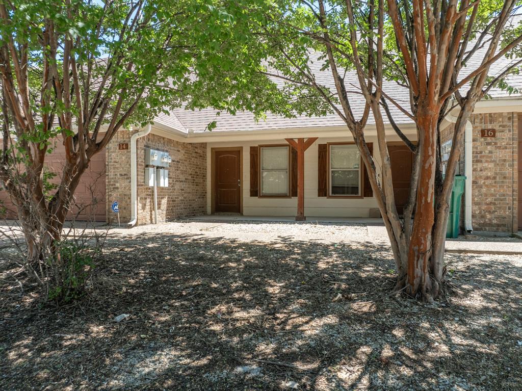 20 Addi Lane Waco, TX 76705 - Photo 15 of 24 a front view of a house with a tree