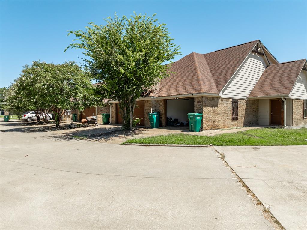 20 Addi Lane Waco, TX 76705 - Photo 9 of 24 a front view of a house with a yard