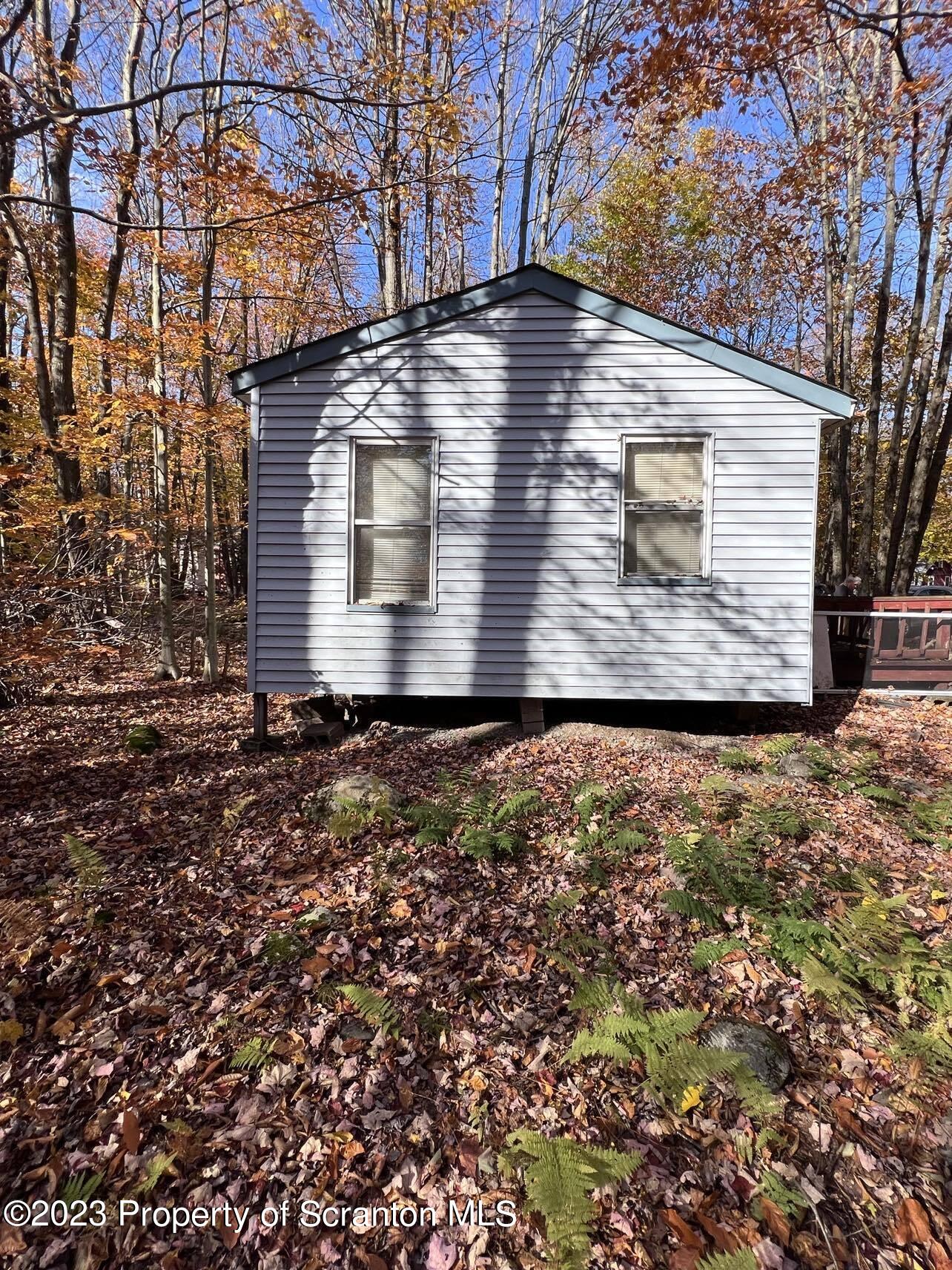 31 Blue Sky Path Gouldsboro, PA 18424 - Photo 4 of 12 a view of a house with a yard
