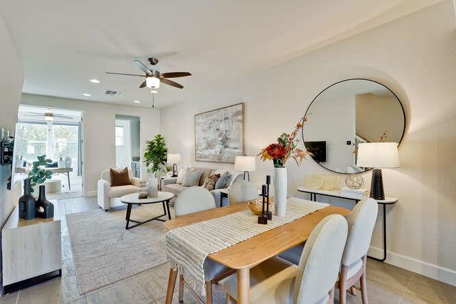 2045 Atlas Loop Mountain View, CA 94043 - Photo 13 of 30 a living room with furniture a chandelier and wooden floor