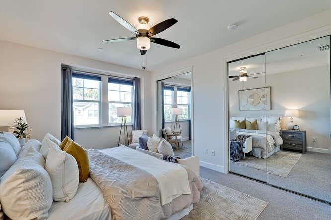 2045 Atlas Loop Mountain View, CA 94043 - Photo 15 of 30 a bedroom with a bed couch and window