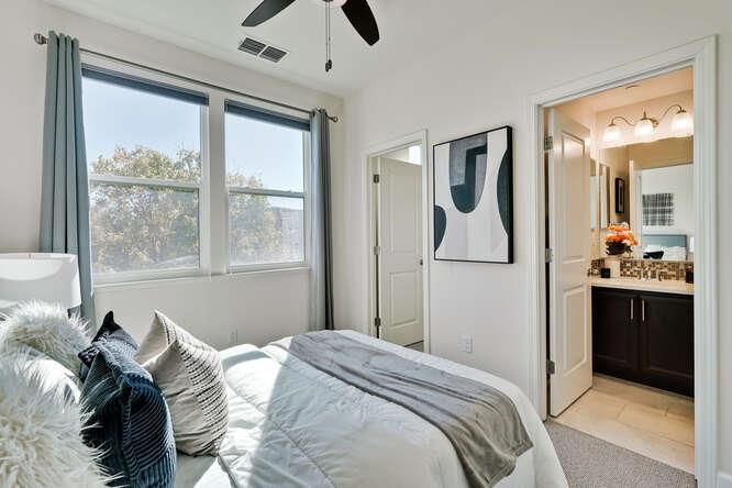 2045 Atlas Loop Mountain View, CA 94043 - Photo 19 of 30 a bedroom with a bed and a large mirror