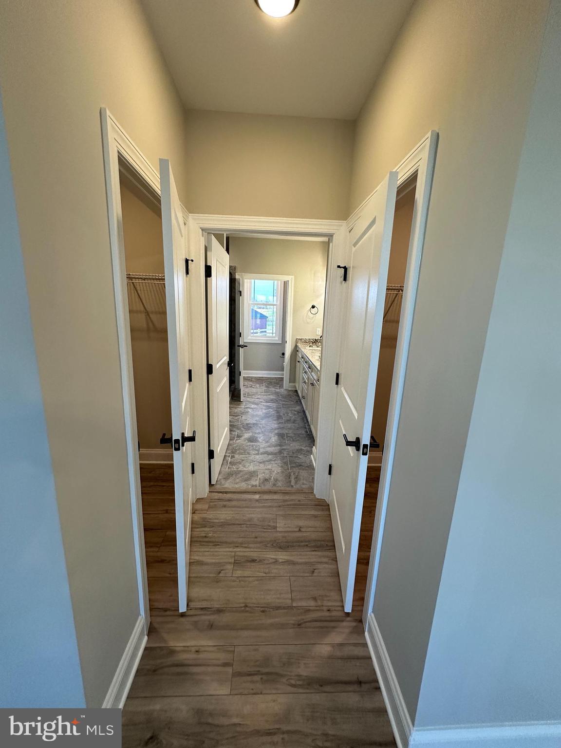 7 Redbud Road Winchester, VA 22603 - Photo 11 of 25 a view of a hallway with wooden floor and staircase