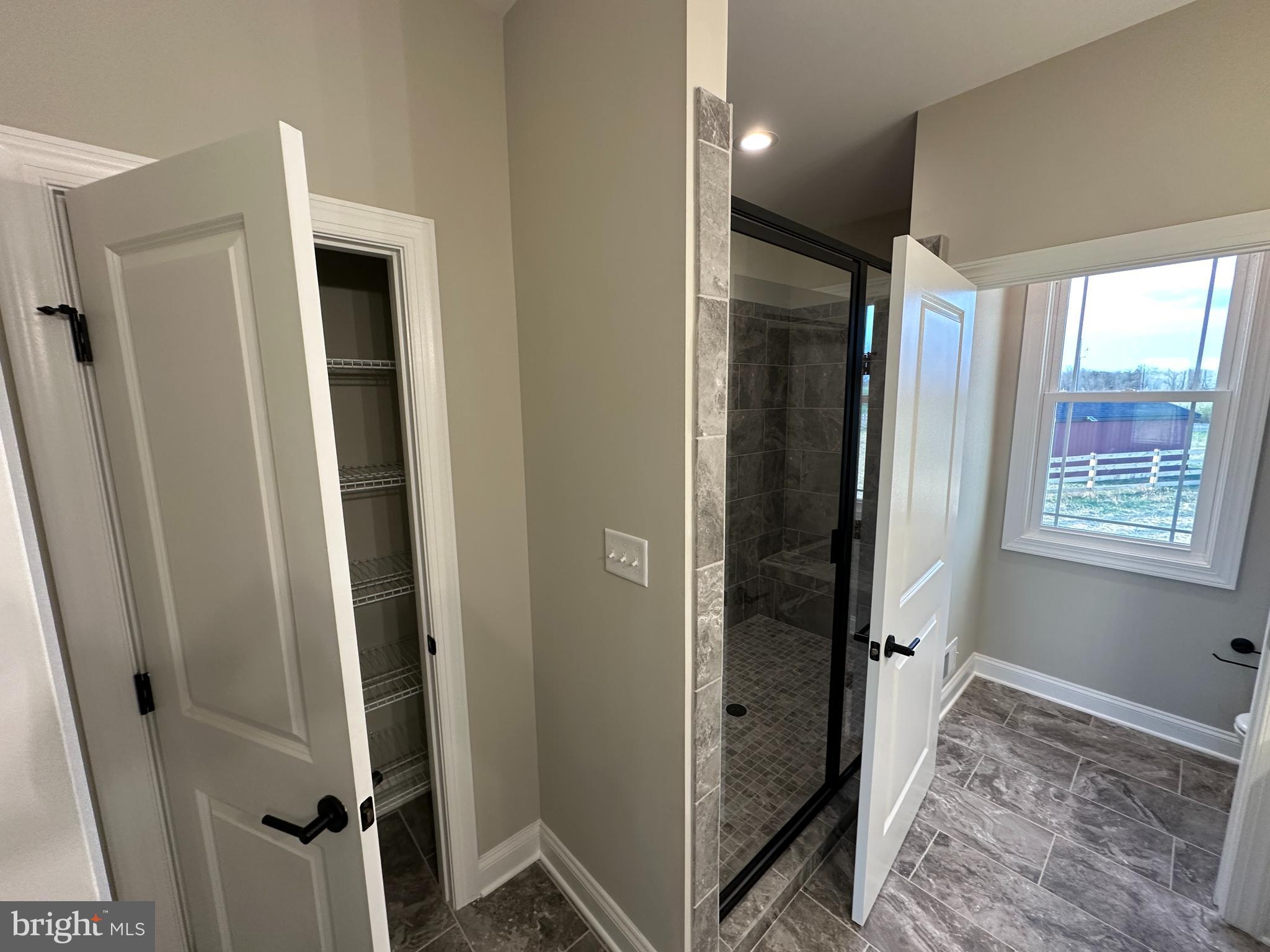 7 Redbud Road Winchester, VA 22603 - Photo 13 of 25 a view of bedroom with a bed and wooden floor