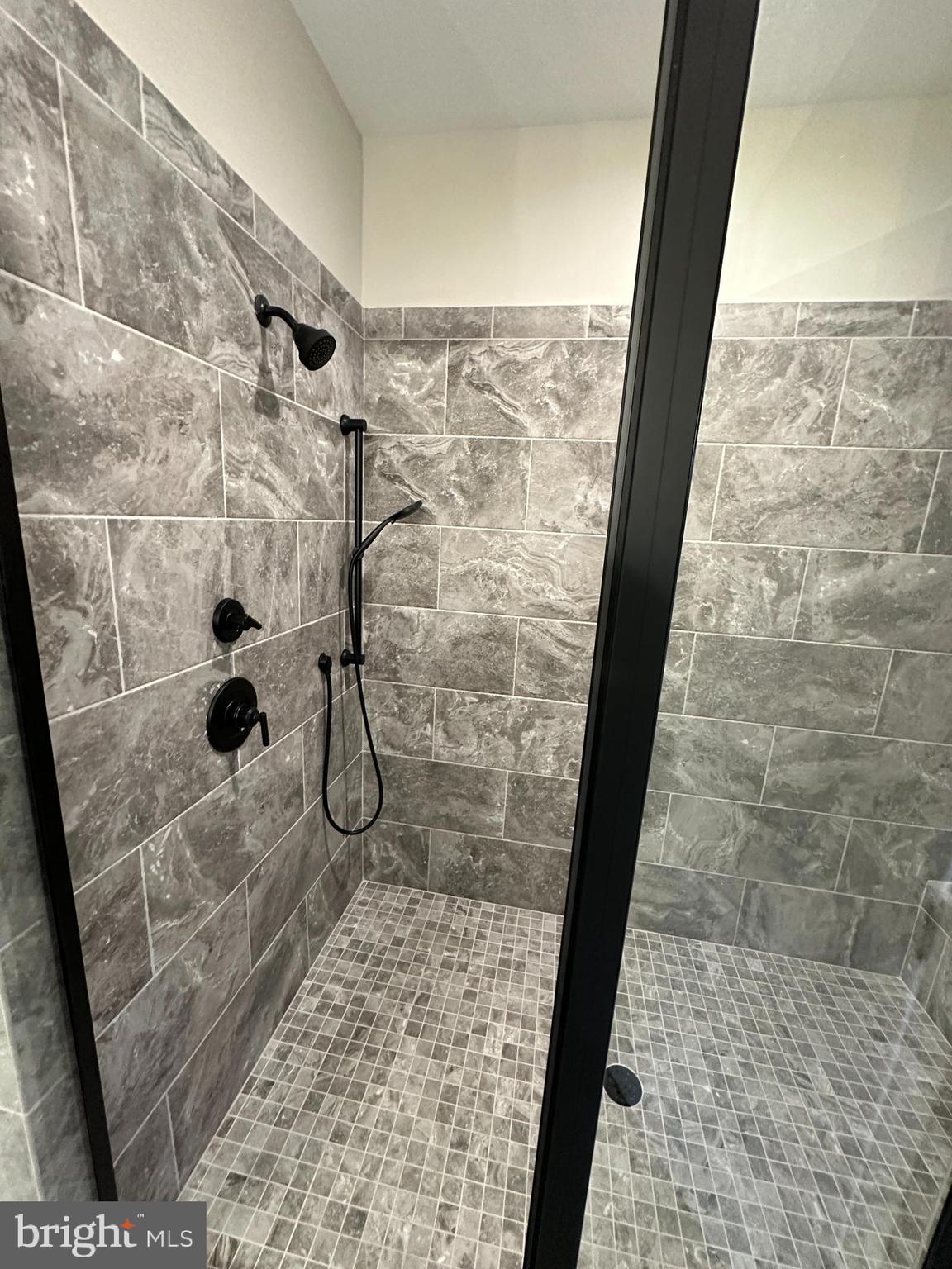 7 Redbud Road Winchester, VA 22603 - Photo 14 of 25 a bathroom with a shower