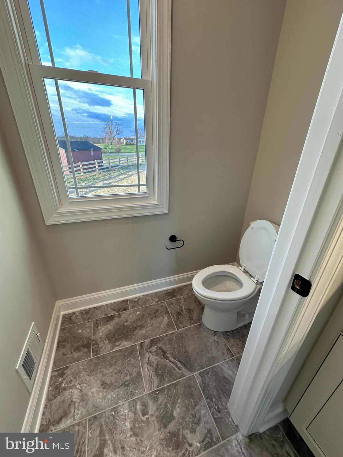 7 Redbud Road Winchester, VA 22603 - Photo 16 of 25 a bathroom with a toilet