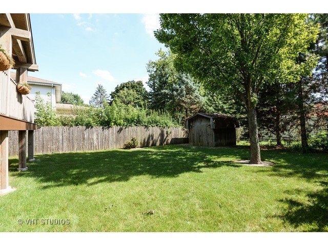1718 Harding Road Northfield, IL 60093 - Photo 10 of 10 a backyard of a house with lots of green space