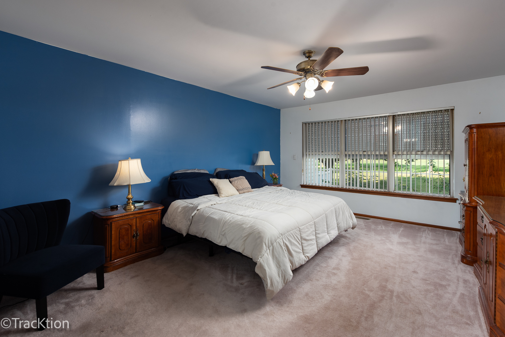 13810 Magnolia Drive Plainfield, IL 60544 - Photo 13 of 30 a bedroom with a bed and a lamp