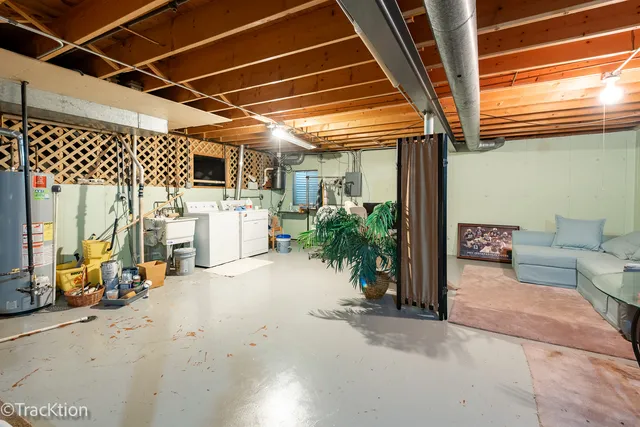 a view of a house with a yard and a fountain
