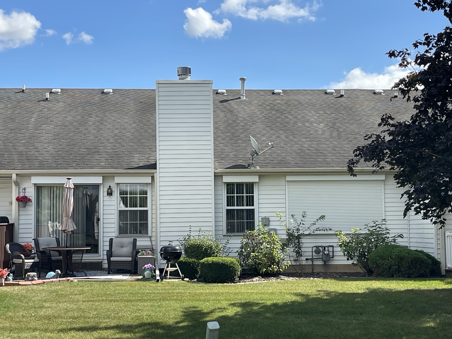 13810 Magnolia Drive Plainfield, IL 60544 - Photo 19 of 30 a view of a house with a yard and a fountain