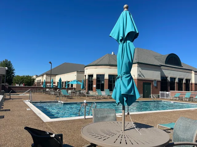 a front view of house with yard and outdoor seating