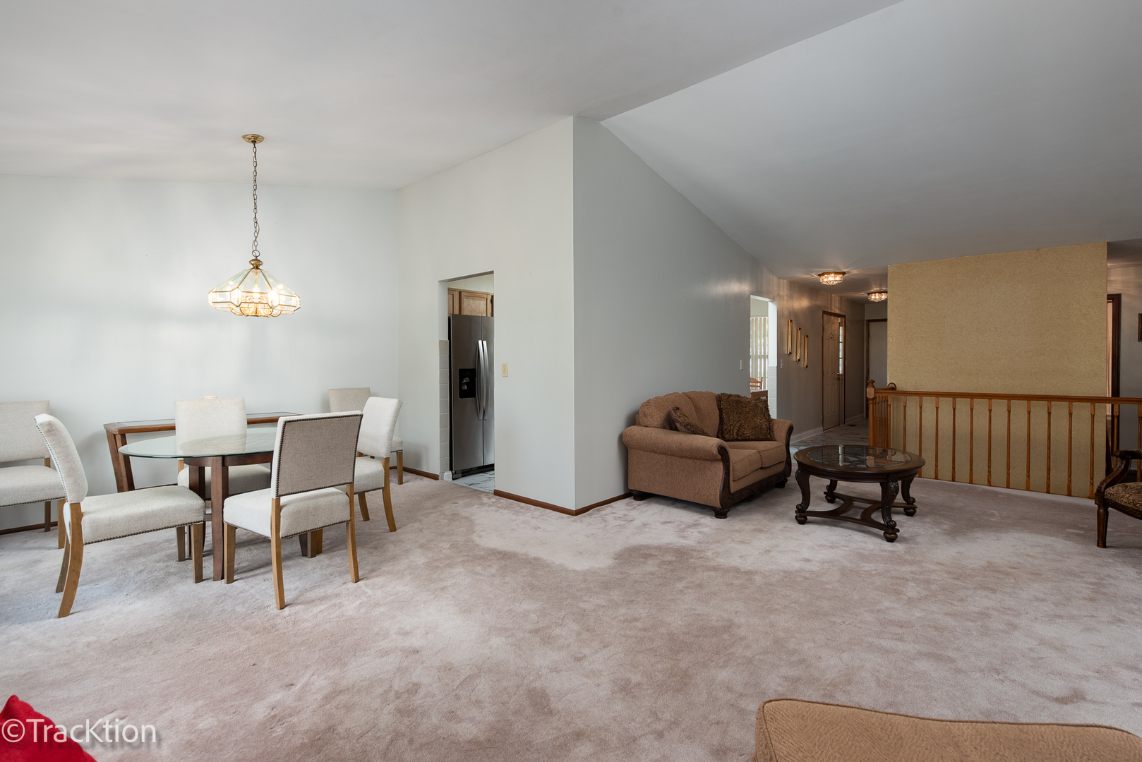 13810 Magnolia Drive Plainfield, IL 60544 - Photo 6 of 30 a living room with furniture and a chandelier