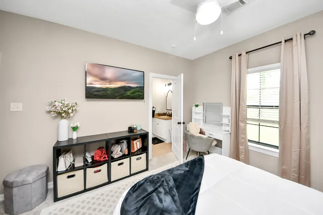 a kitchen with a refrigerator and a stove