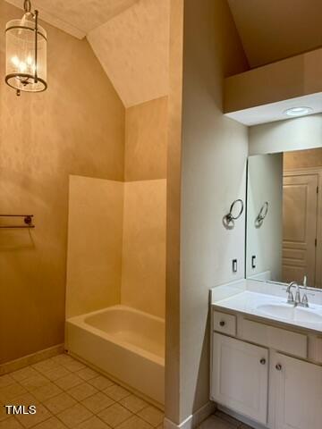 7530 Lead Mine Road, Unit 306 Raleigh, NC 27615 - Photo 25 of 29 a bathroom with a granite countertop sink a mirror and a bathtub