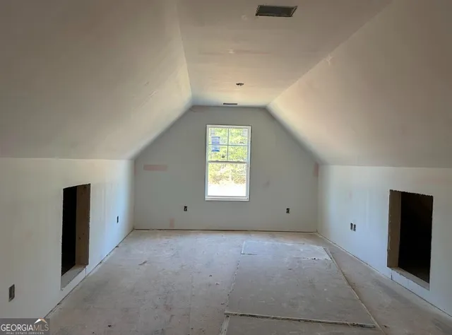 a view of mountain view with large trees