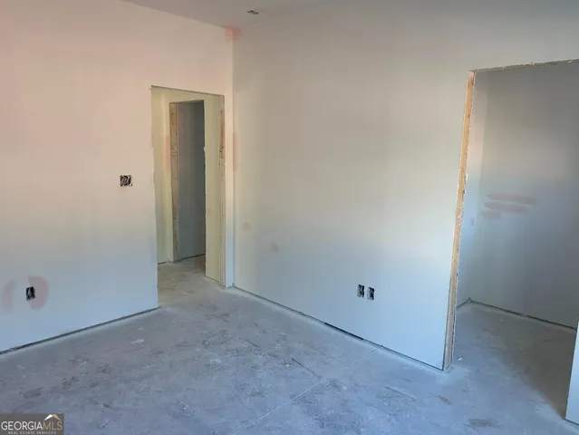 an empty room with closet