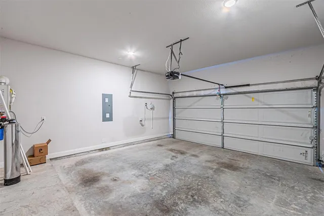 a very nice looking kitchen with chandelier