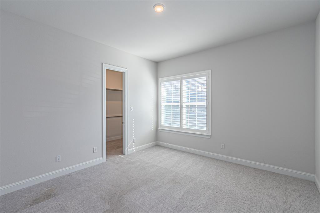 6753 Verandah Way Irving, TX 75039 - Photo 21 of 40 an empty room with a window