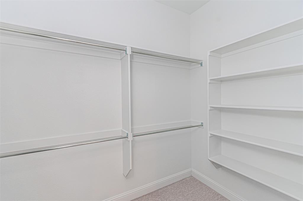 6753 Verandah Way Irving, TX 75039 - Photo 22 of 40 a view of an empty walk in closet