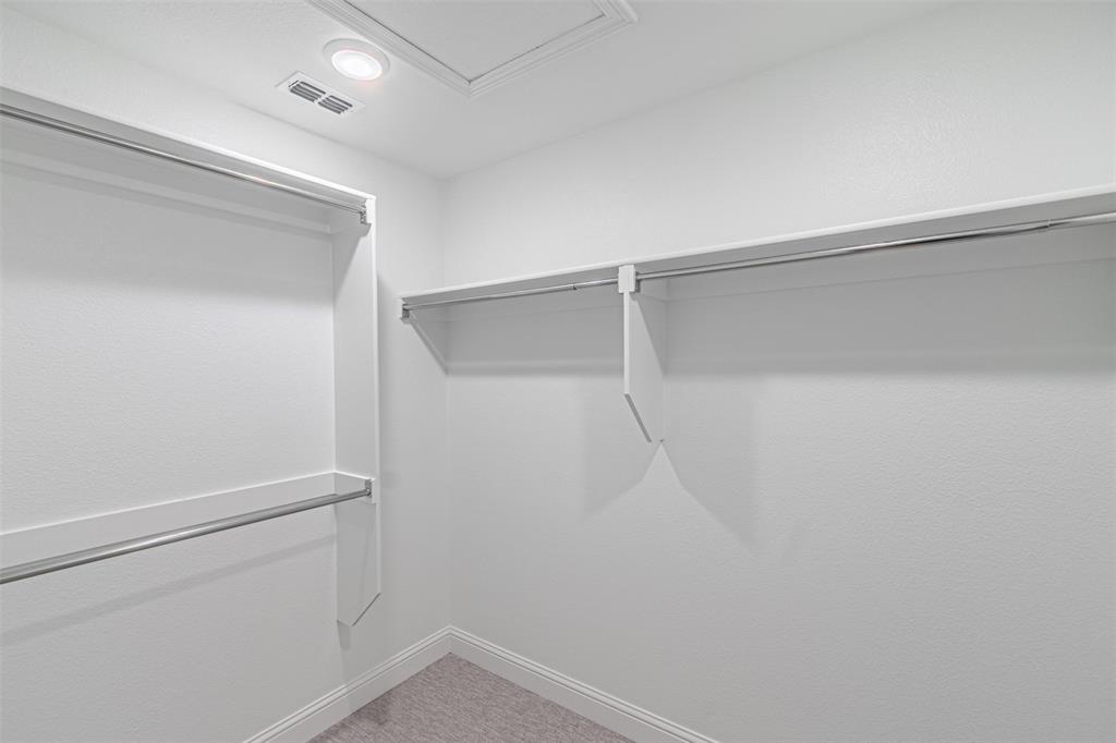 6753 Verandah Way Irving, TX 75039 - Photo 25 of 40 a view of an empty walk in closet