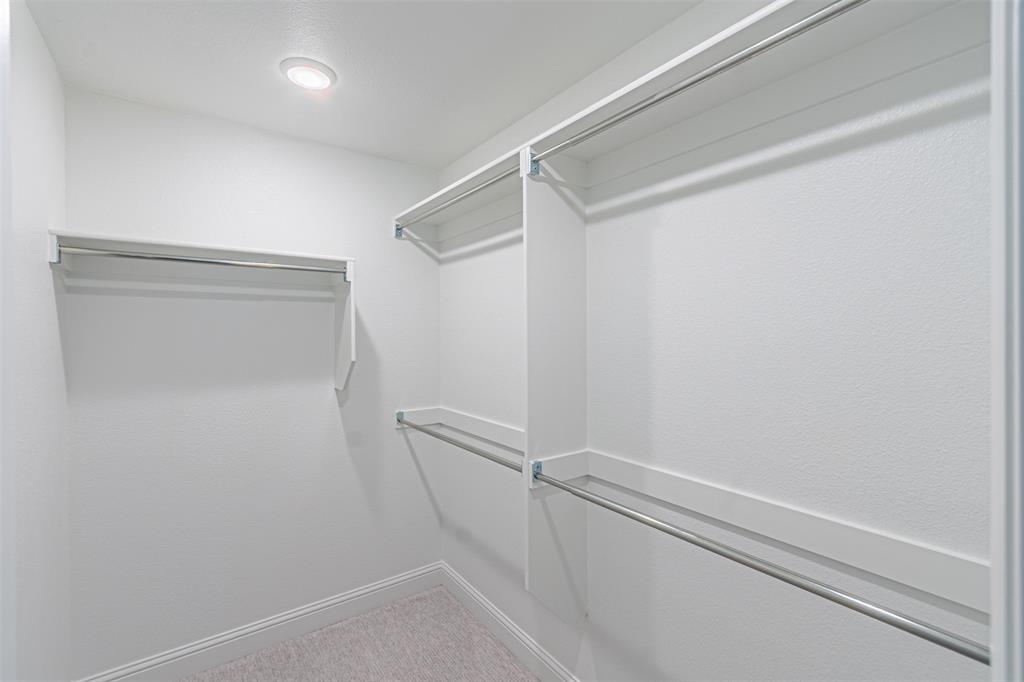 6753 Verandah Way Irving, TX 75039 - Photo 31 of 40 a view of an empty walk in closet