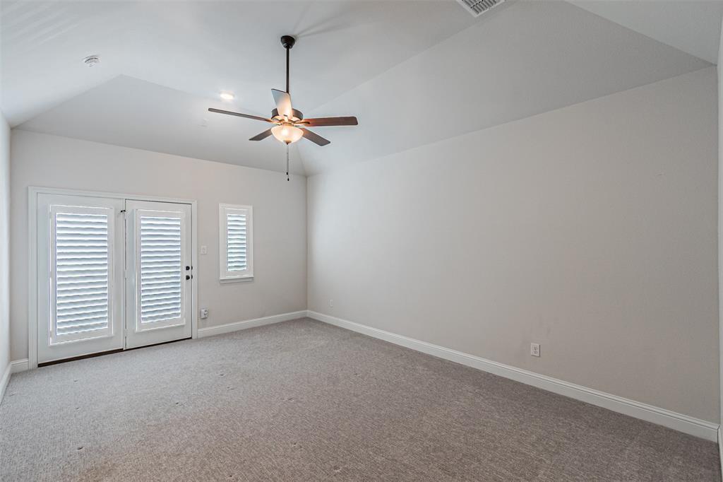 6753 Verandah Way Irving, TX 75039 - Photo 33 of 40 an empty room with windows and fan