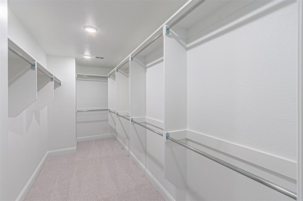6753 Verandah Way Irving, TX 75039 - Photo 37 of 40 a view of an empty walk in closet
