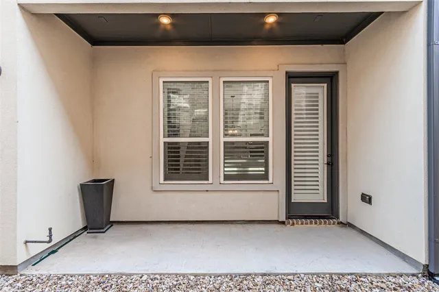 a bathroom with a shower and a sink