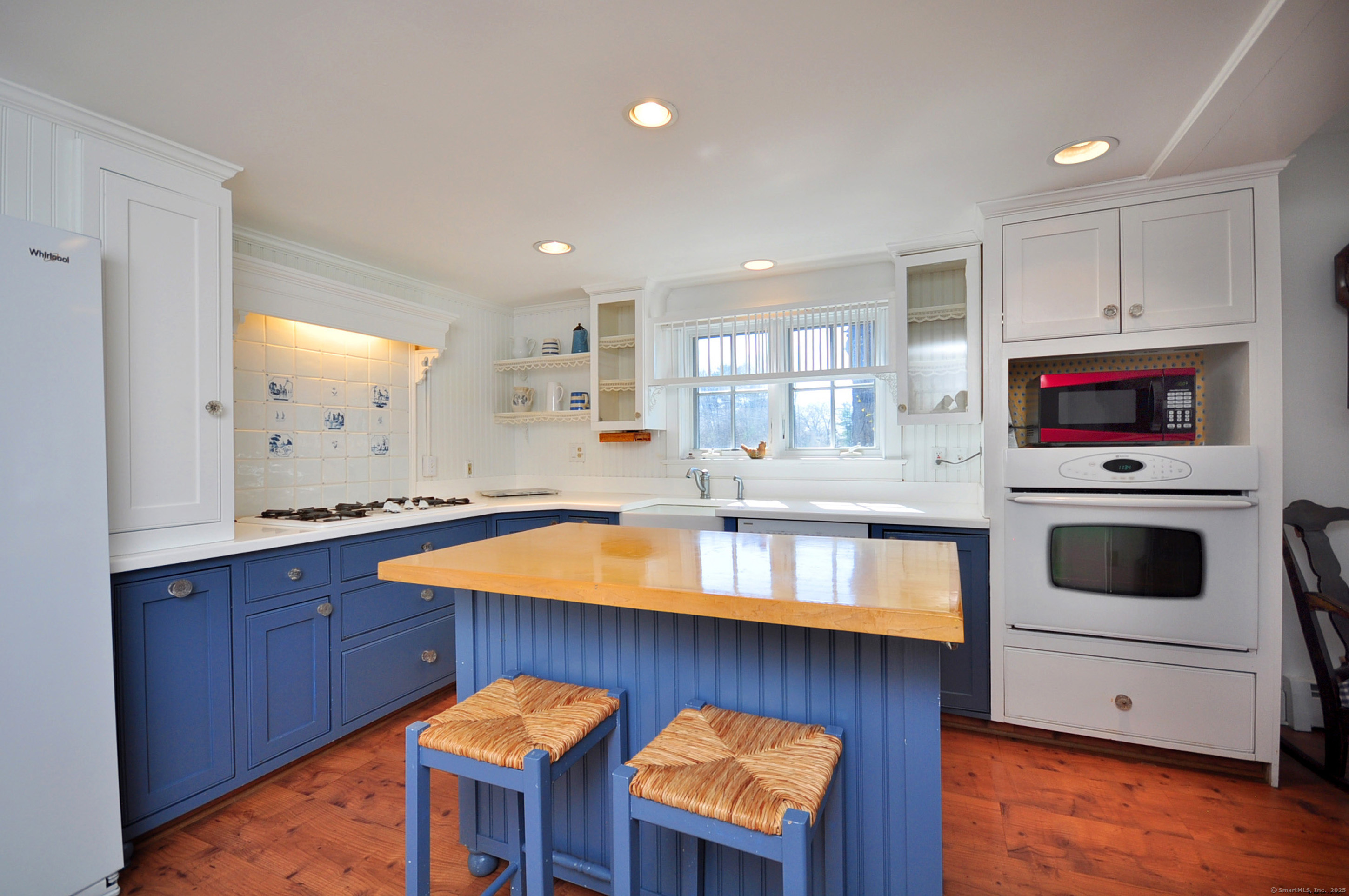 72 Clapboard Road Bridgewater, CT 06752 - Photo 14 of 39 a kitchen with stainless steel appliances granite countertop a kitchen island a stove a sink and a microwave