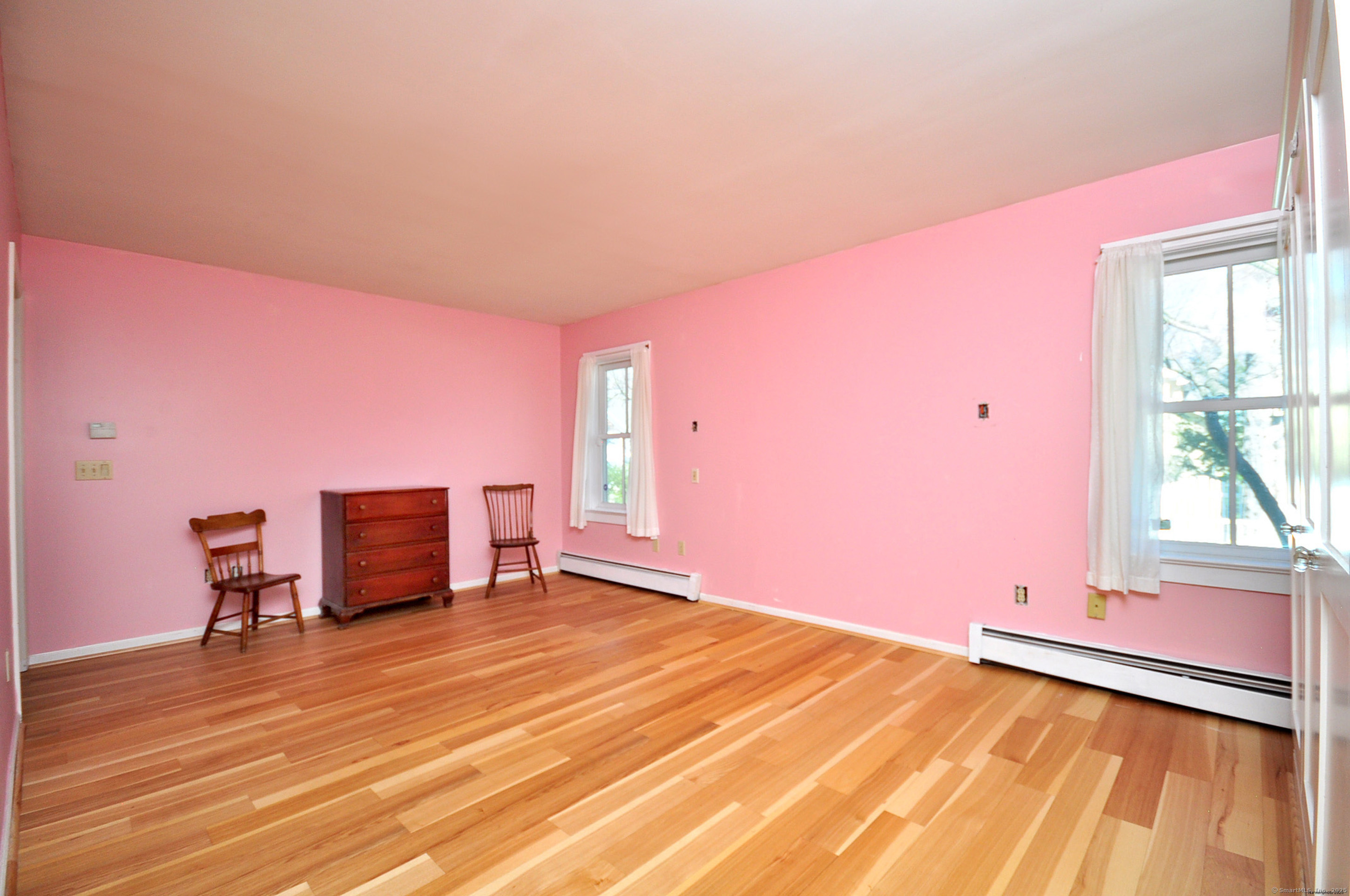 72 Clapboard Road Bridgewater, CT 06752 - Photo 25 of 39 a view of a livingroom with wooden floor and furniture