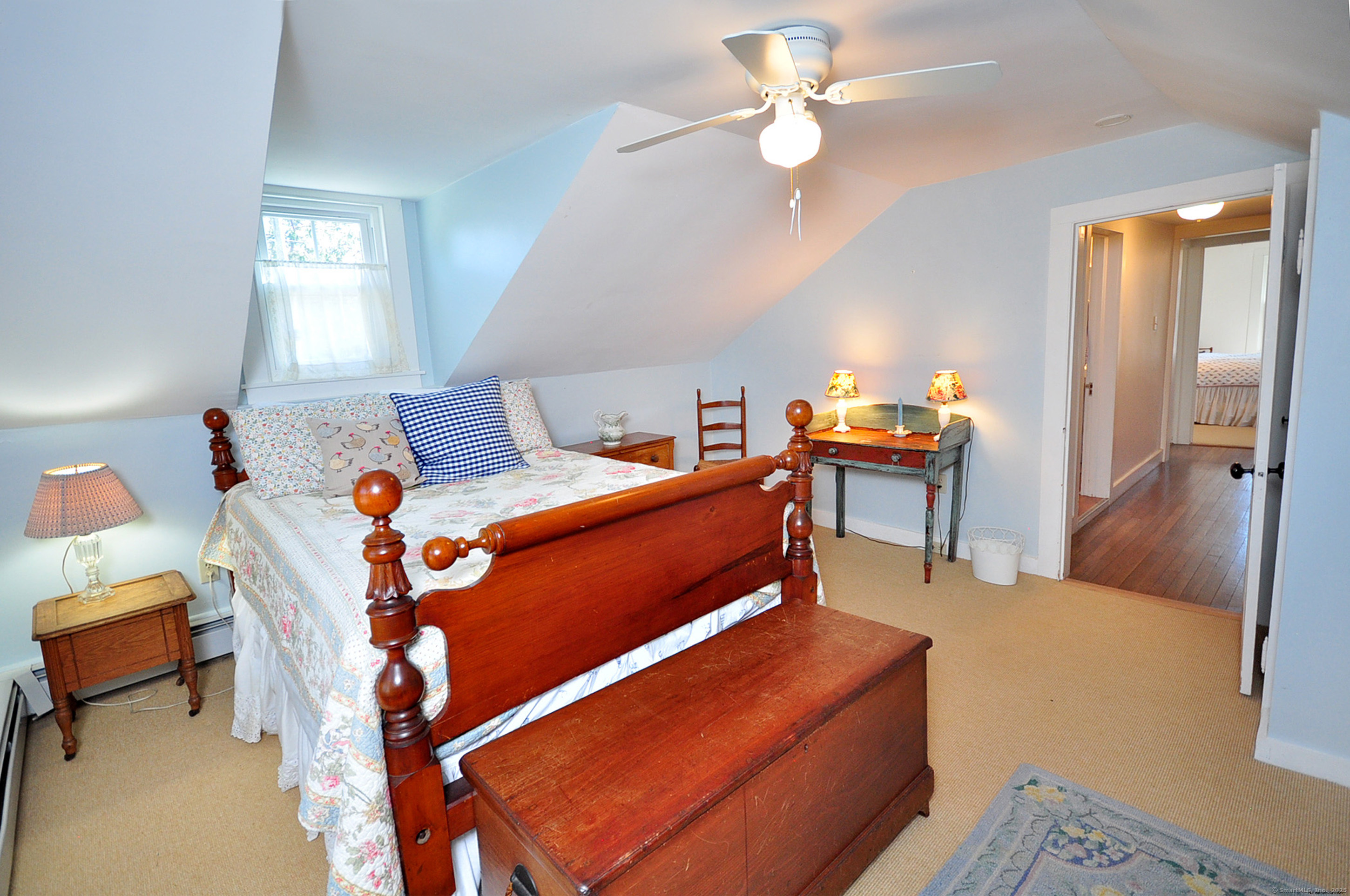 72 Clapboard Road Bridgewater, CT 06752 - Photo 30 of 39 a living room with furniture and a chandelier
