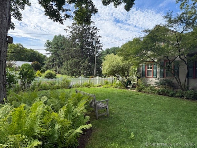 72 Clapboard Road Bridgewater, CT 06752 - Photo 37 of 39 a view of backyard with table and chairs and potted plants