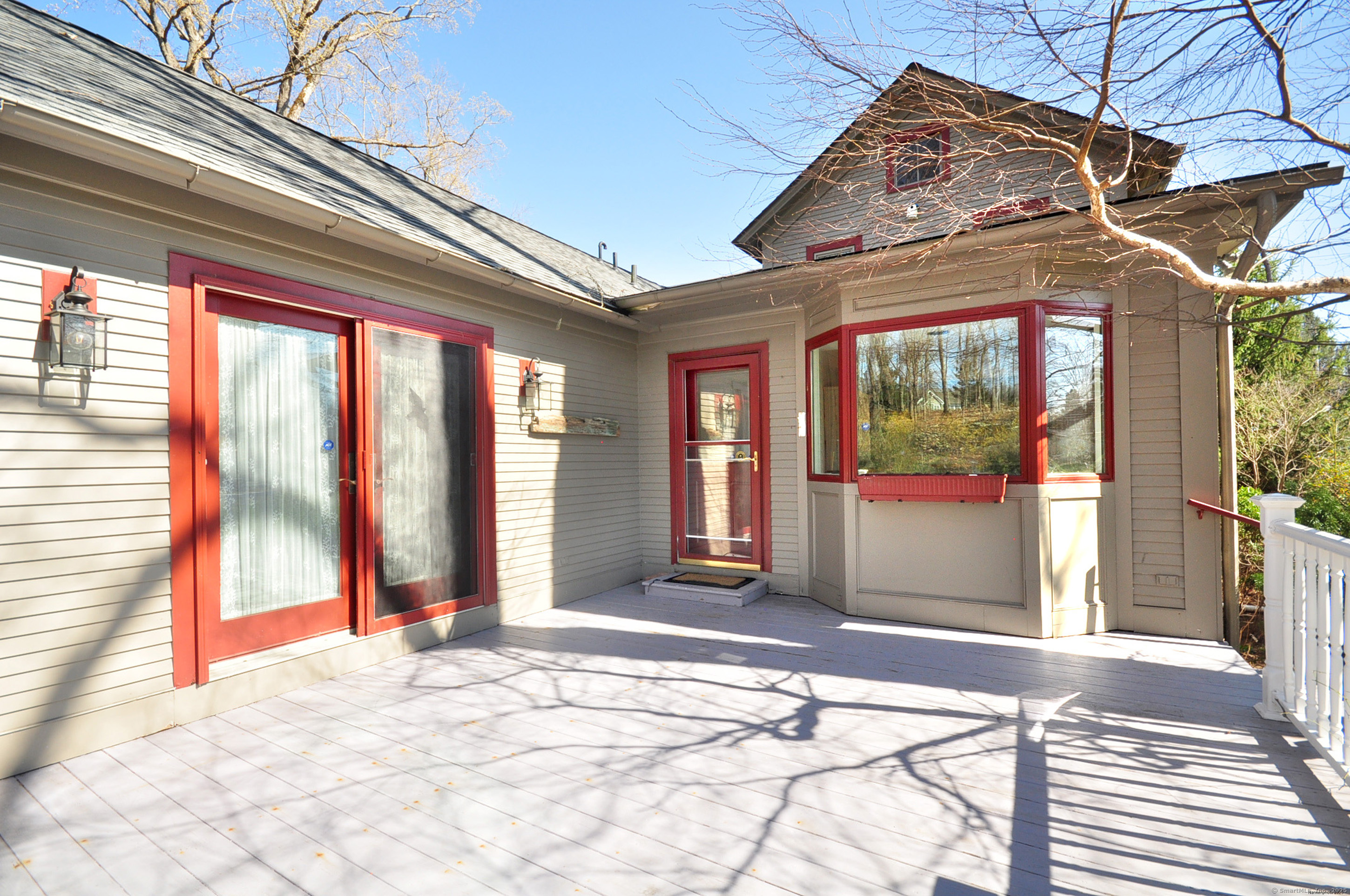 72 Clapboard Road Bridgewater, CT 06752 - Photo 6 of 39 a view of a porch with a table and chairs
