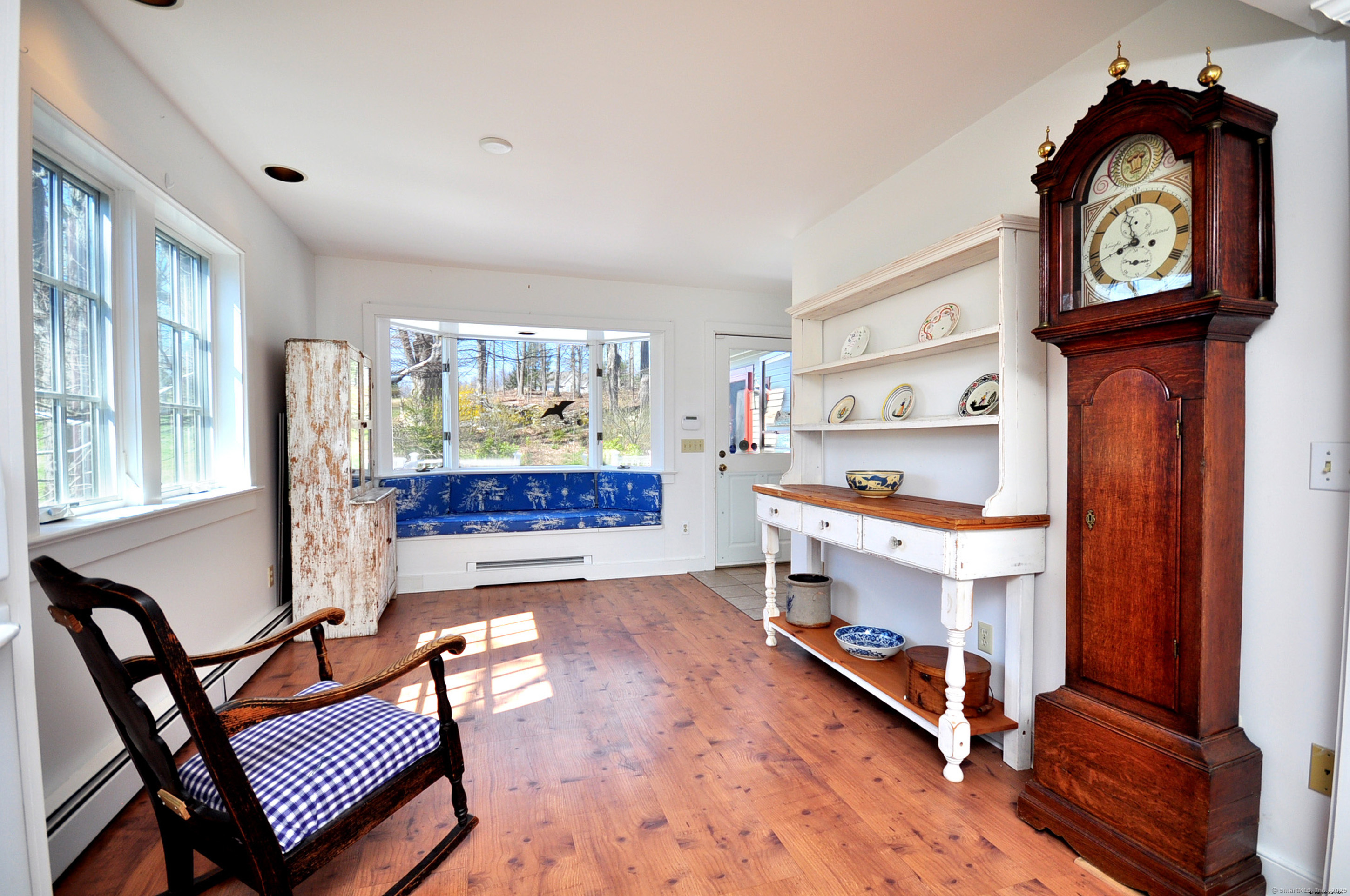 72 Clapboard Road Bridgewater, CT 06752 - Photo 9 of 39 a living room with furniture a rug and a window