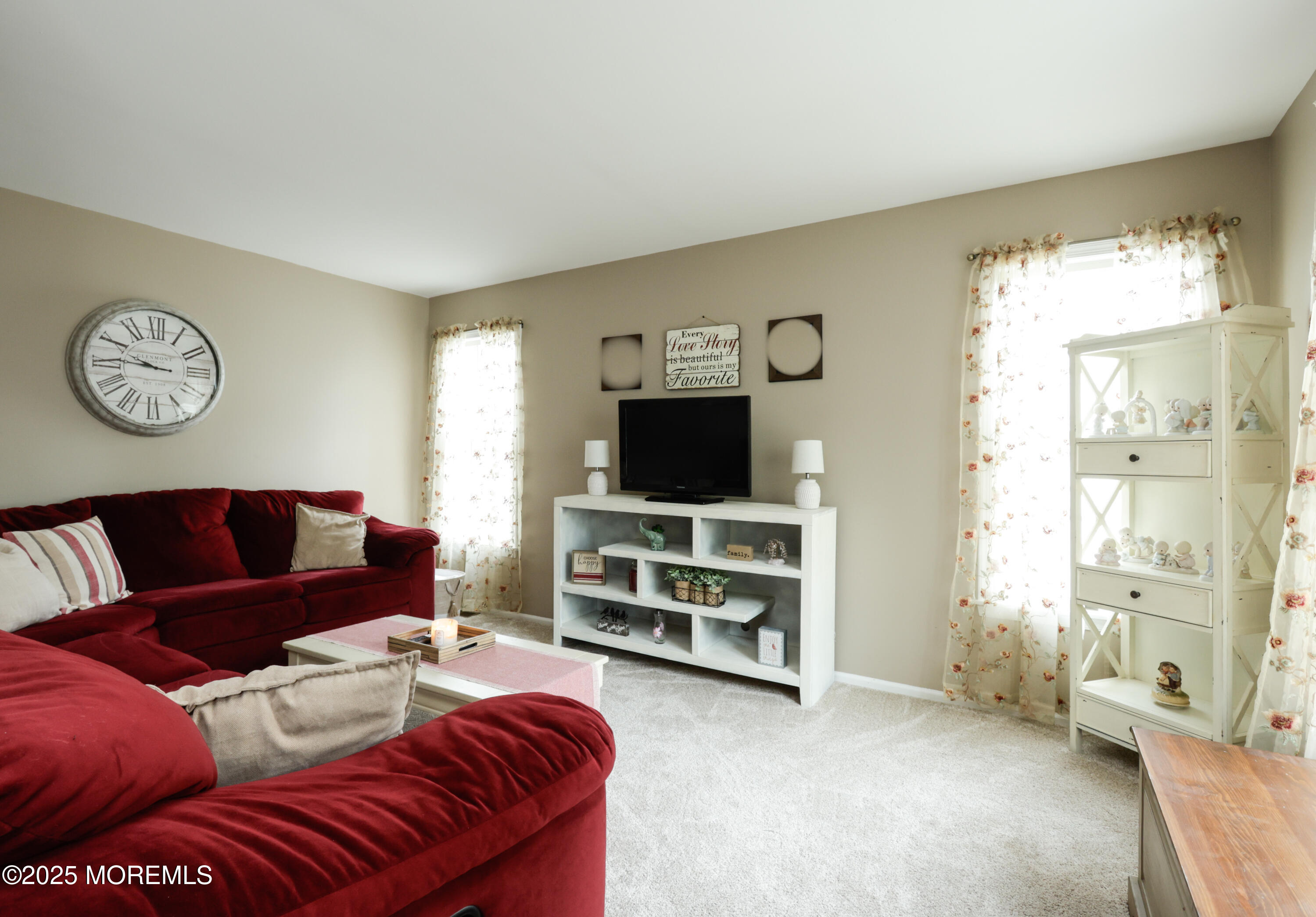 204 Stormy Road Manahawkin, NJ 08050 - Photo 12 of 44 a living room with furniture and a flat screen tv
