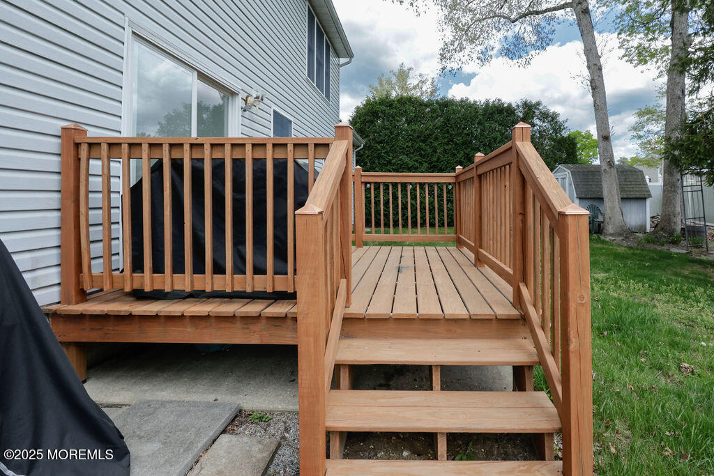 204 Stormy Road Manahawkin, NJ 08050 - Photo 37 of 44 a view of outdoor space with deck and barbeque oven
